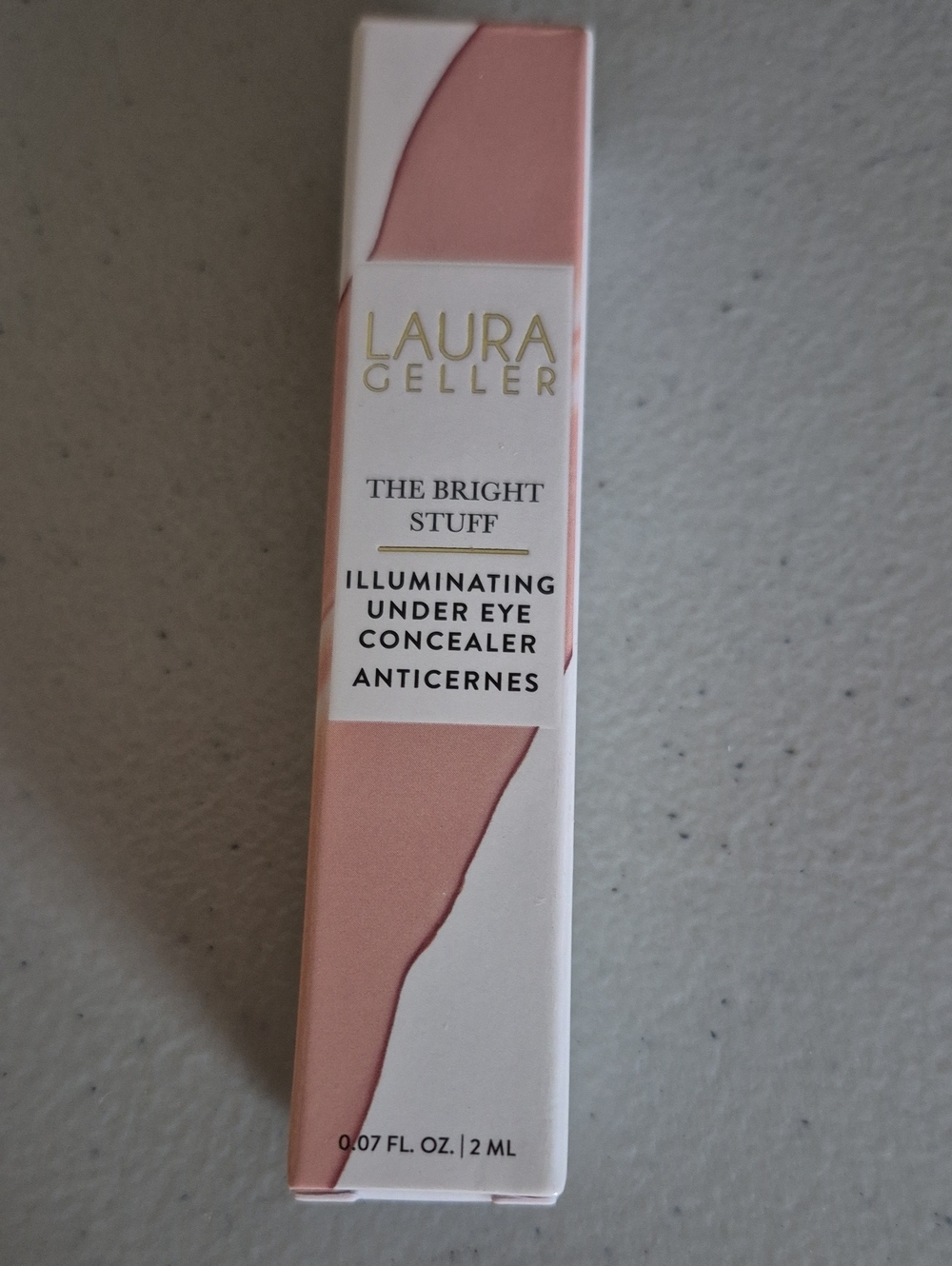 Laura Geller Illuminating Under Eye Concealer - Light Pink and White Packaging